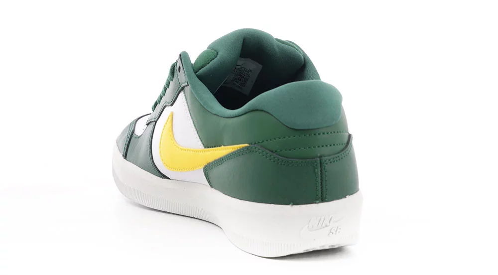 green nike shoes