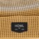 Howl Stripe Beanie - tan - front detail