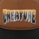 Creature Logo Mesh Trucker Hat - brown/black - front detail