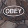 Obey Oval Strapback Hat - fence camo - front detail