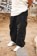 Tactics Unless Silas Baxter-Neal Pants - black - lifestyle 1