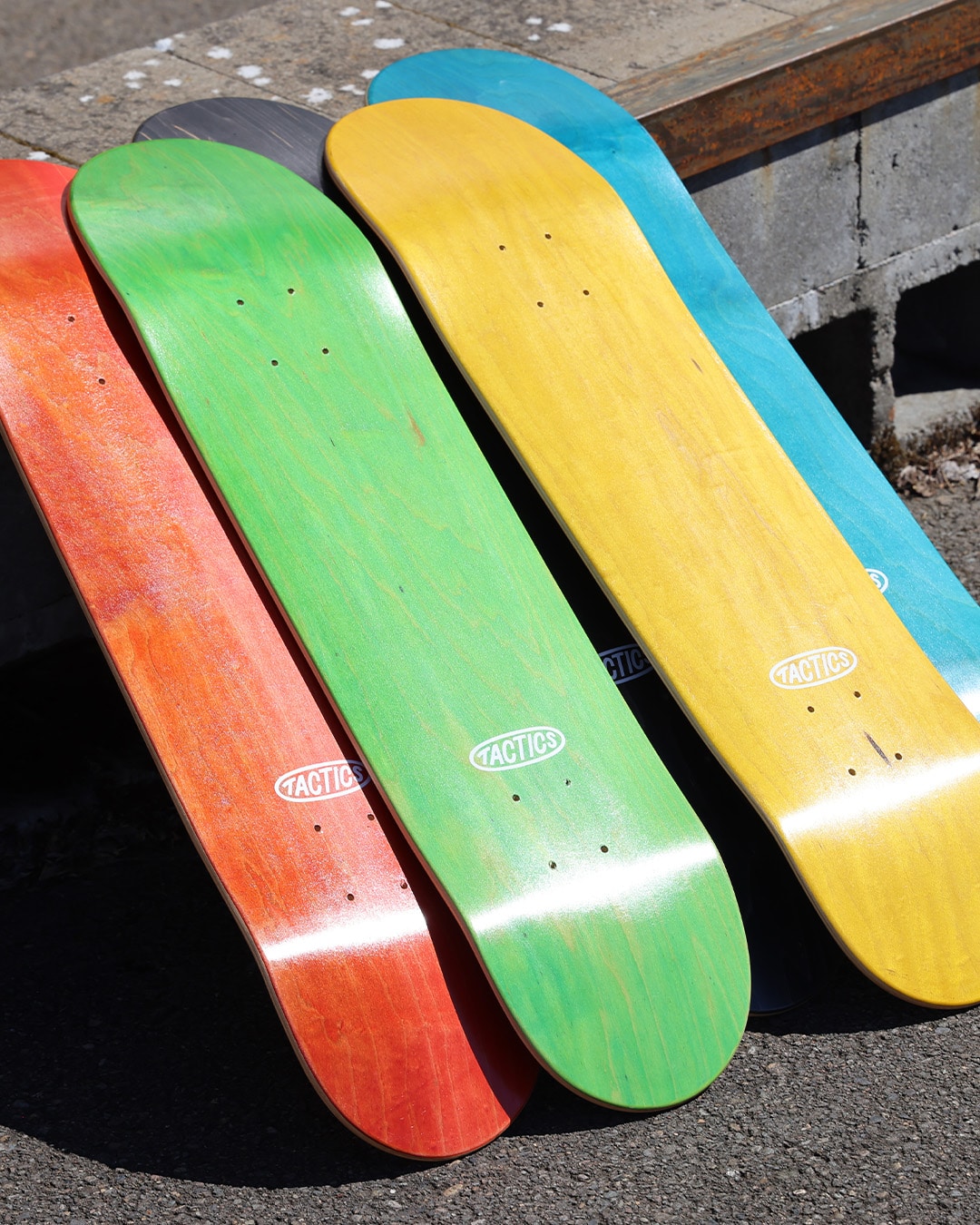 tactics skate deck brand image